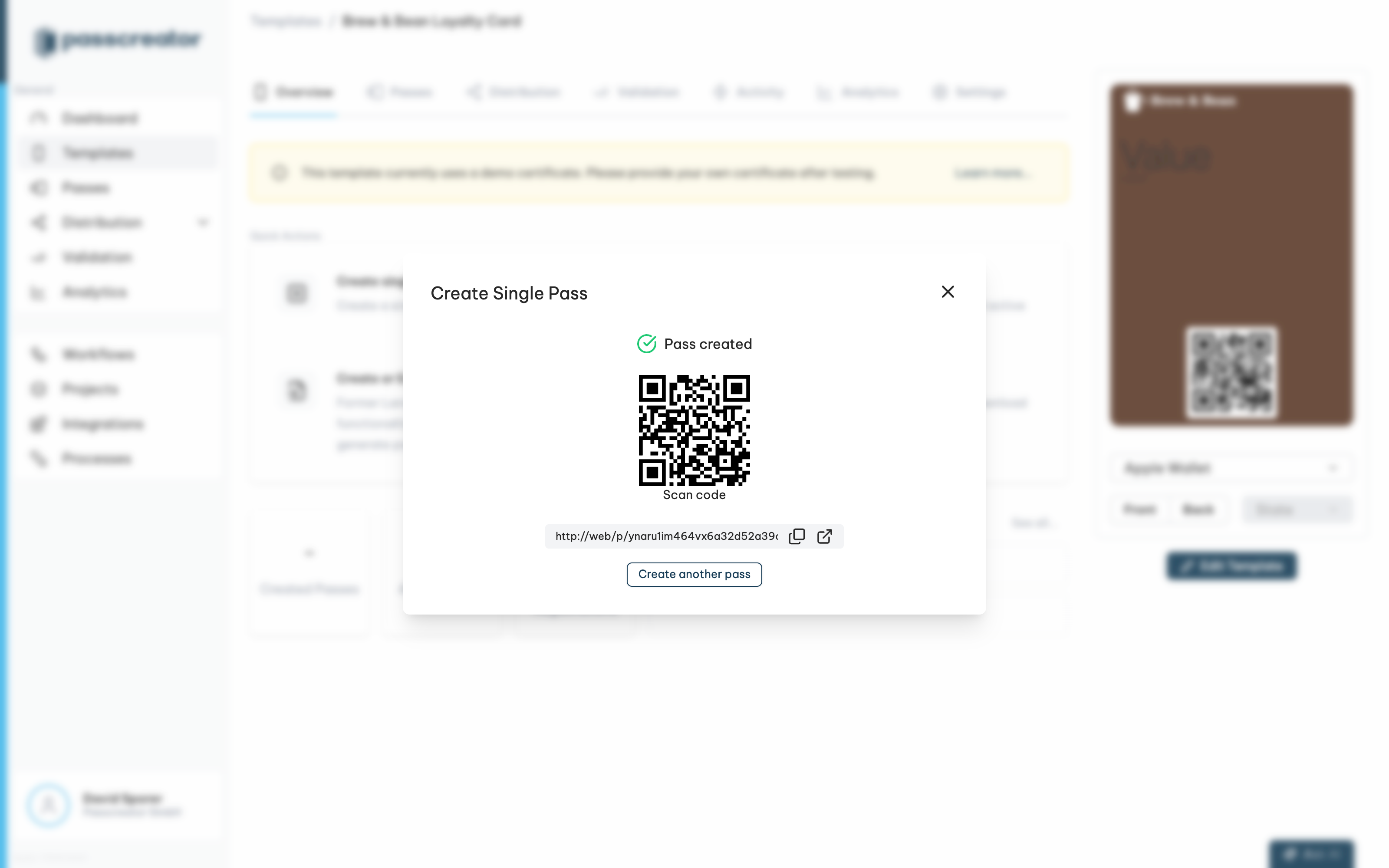 The pass created screen with the QR code and download link
